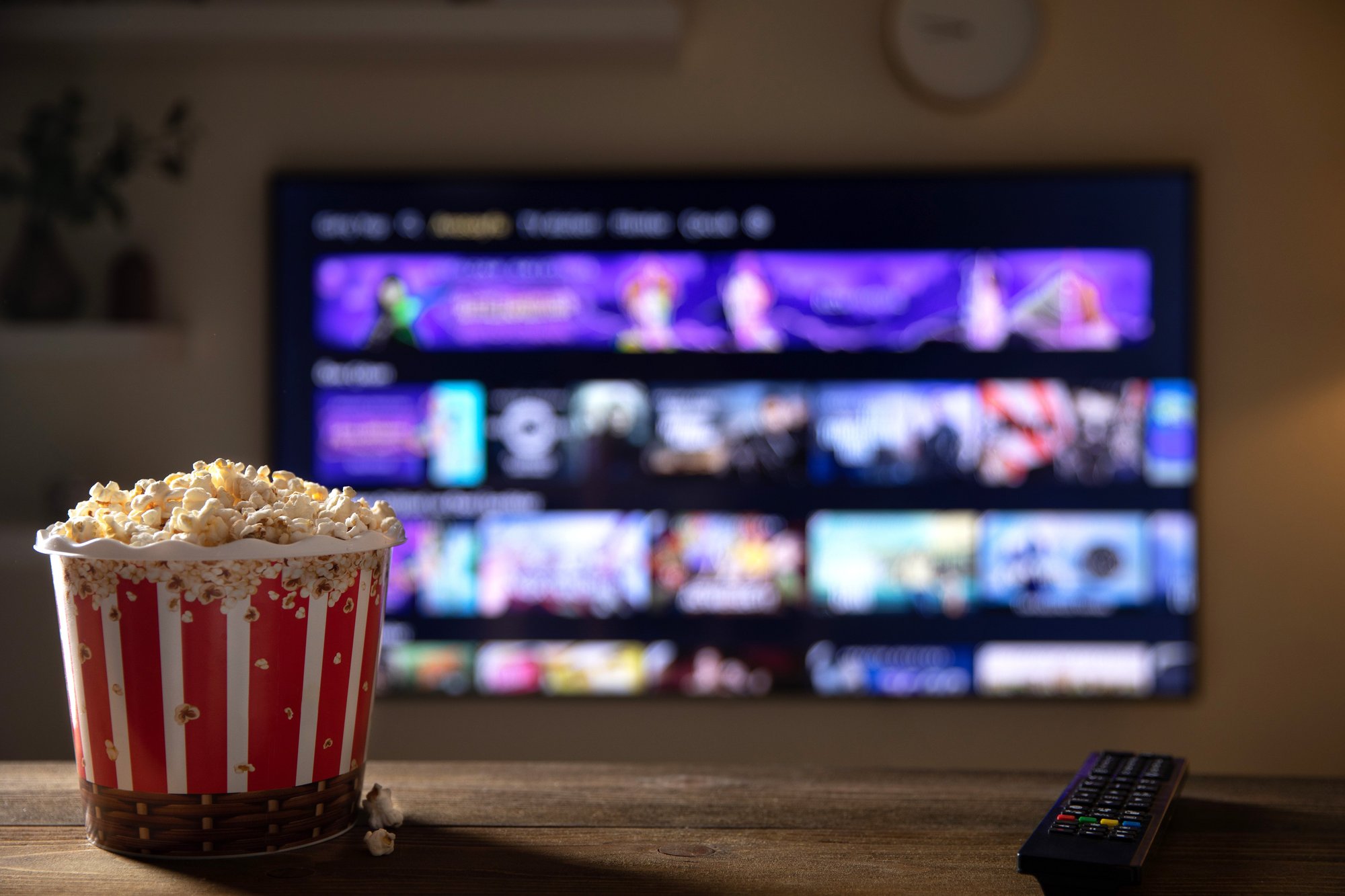 close-up-of-bowl-of-popcorn-and-remote-control-wit-2024-12-06-22-09-48-utc close-up-of-bowl-of-popcorn-and-remote-control-wit-2024-12-06-22-09-48-utc